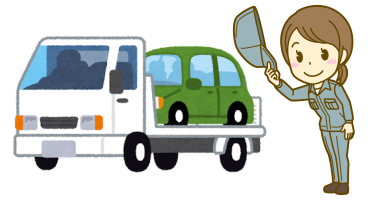 積載車で車を引き取るスタッフ